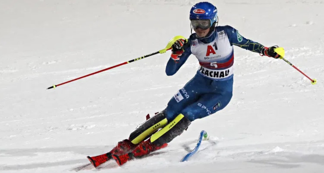 Woman alpine skiing slalom